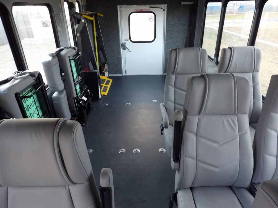 HLE shuttle interior configured with wheelchair positions and securement