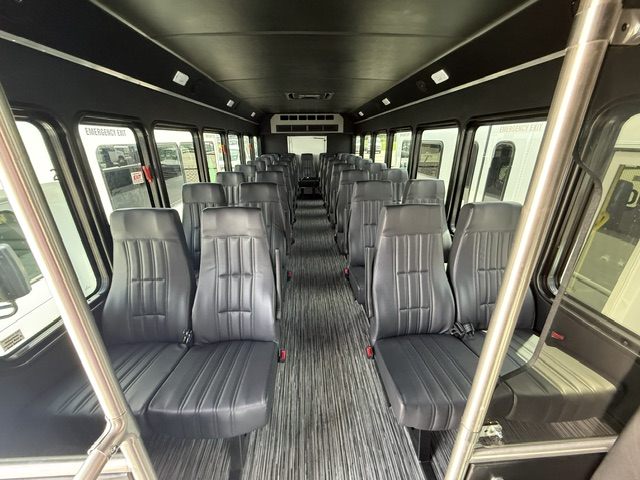 Kavlyr interior with gray leather seating and wood-look flooring