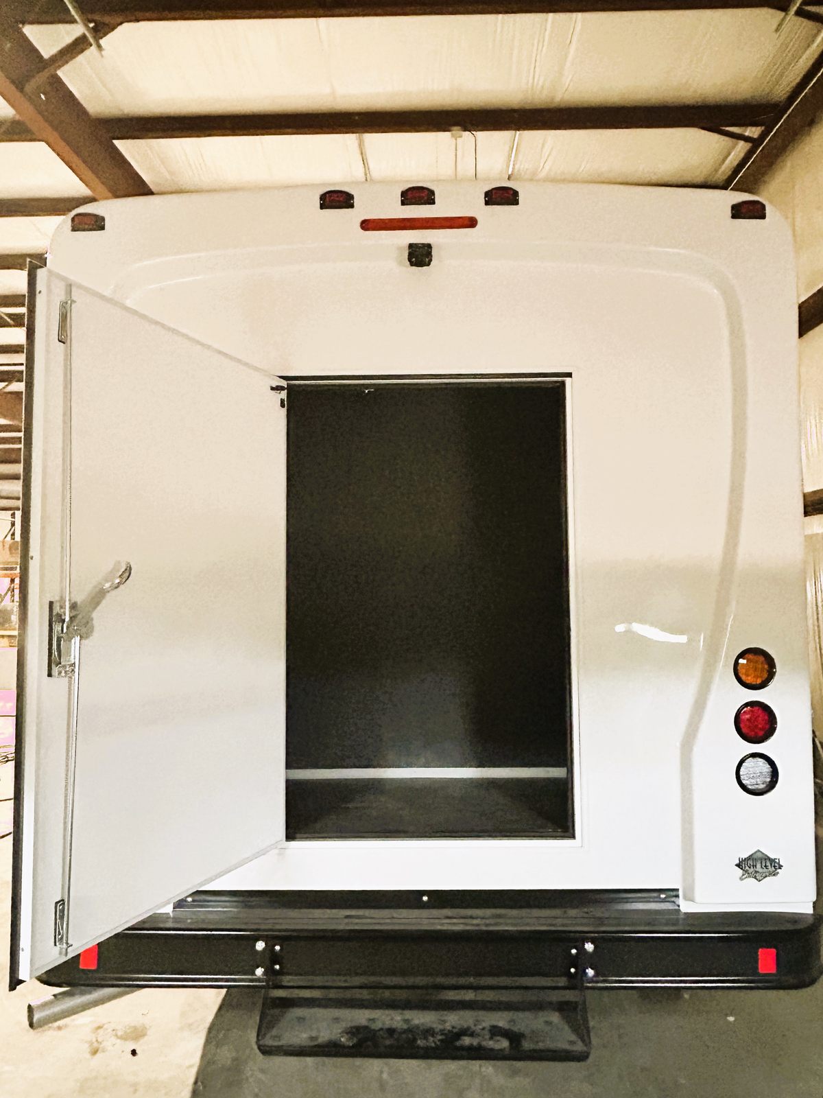 Mavryk rear luggage compartment with door open