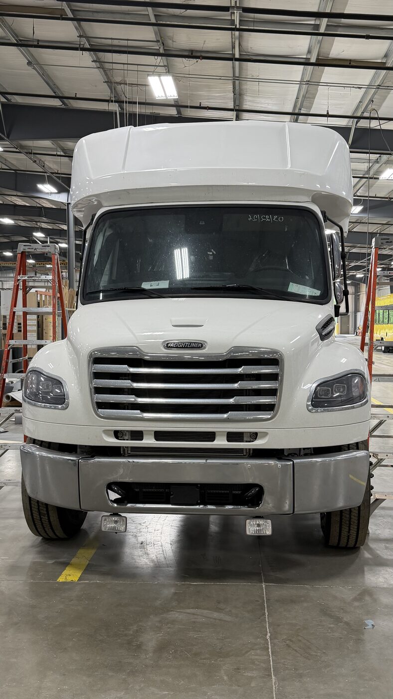 HLE Stratos shuttle bus on the Freightliner S2C chassis, front exterior view outdoors