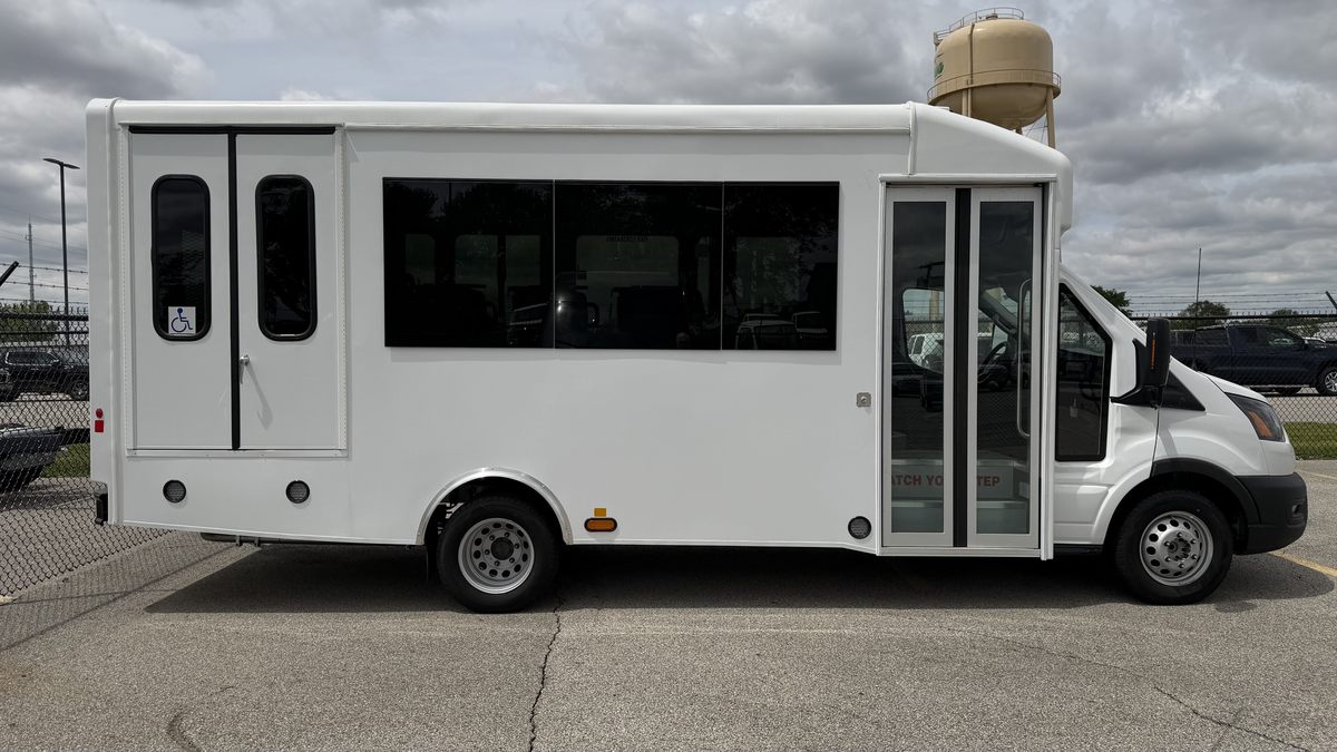 HLE Strykr Ford Transit shuttle, passenger side with entry door open