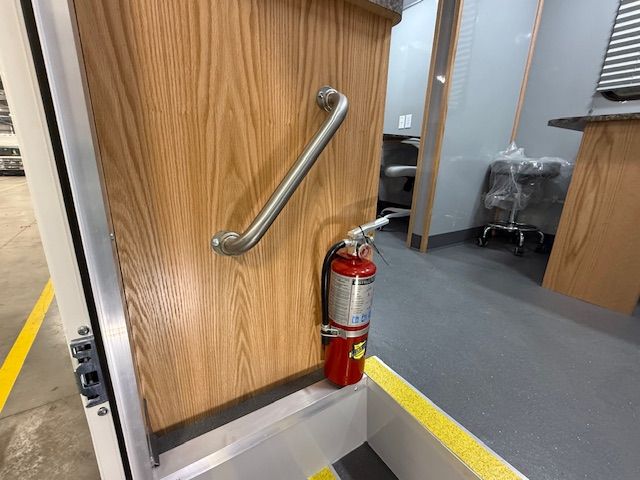 Corrections transport interior corridor with secure finishes and grab rail