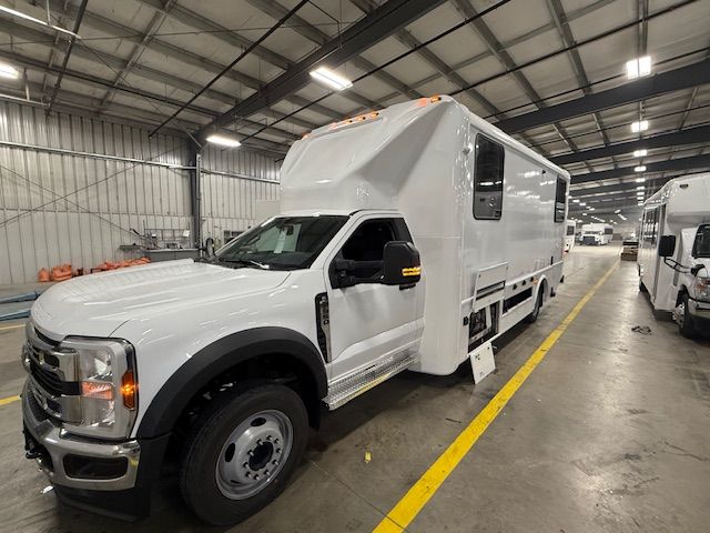 Corrections transport vehicle on a Ford heavy-duty chassis, side view with door open