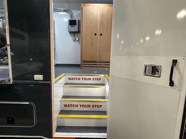 Mobile training lab entry steps with safety markings