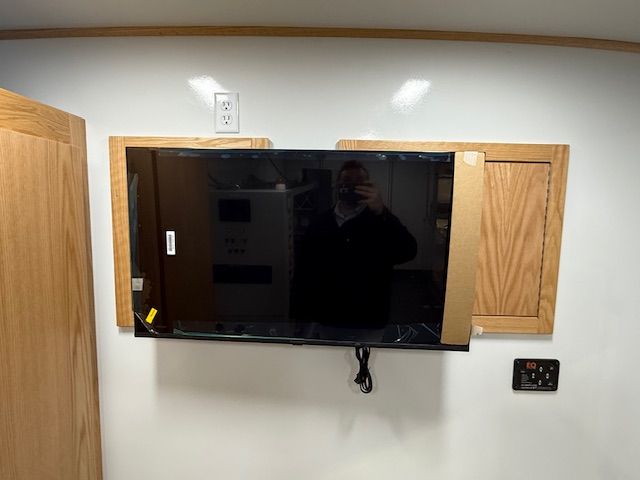 Mobile training lab interior with media wall and whiteboard
